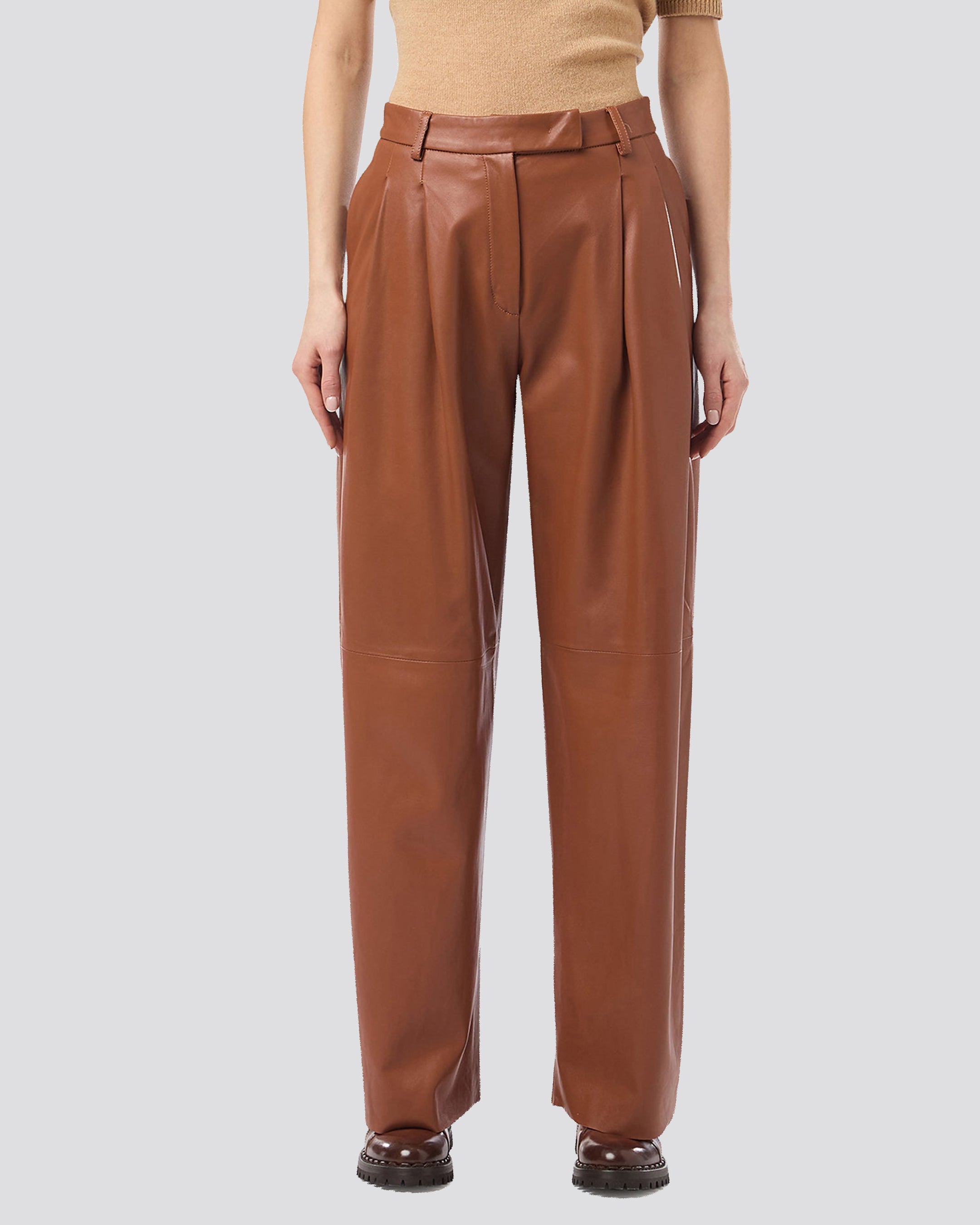 LEATHER TROUSERS WITH PENCES