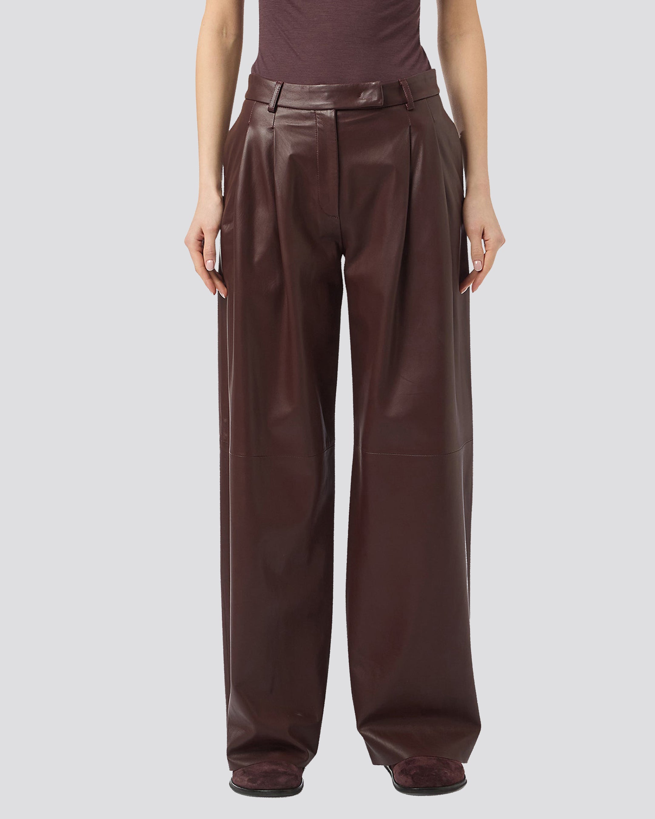 LEATHER TROUSERS WITH PENCES