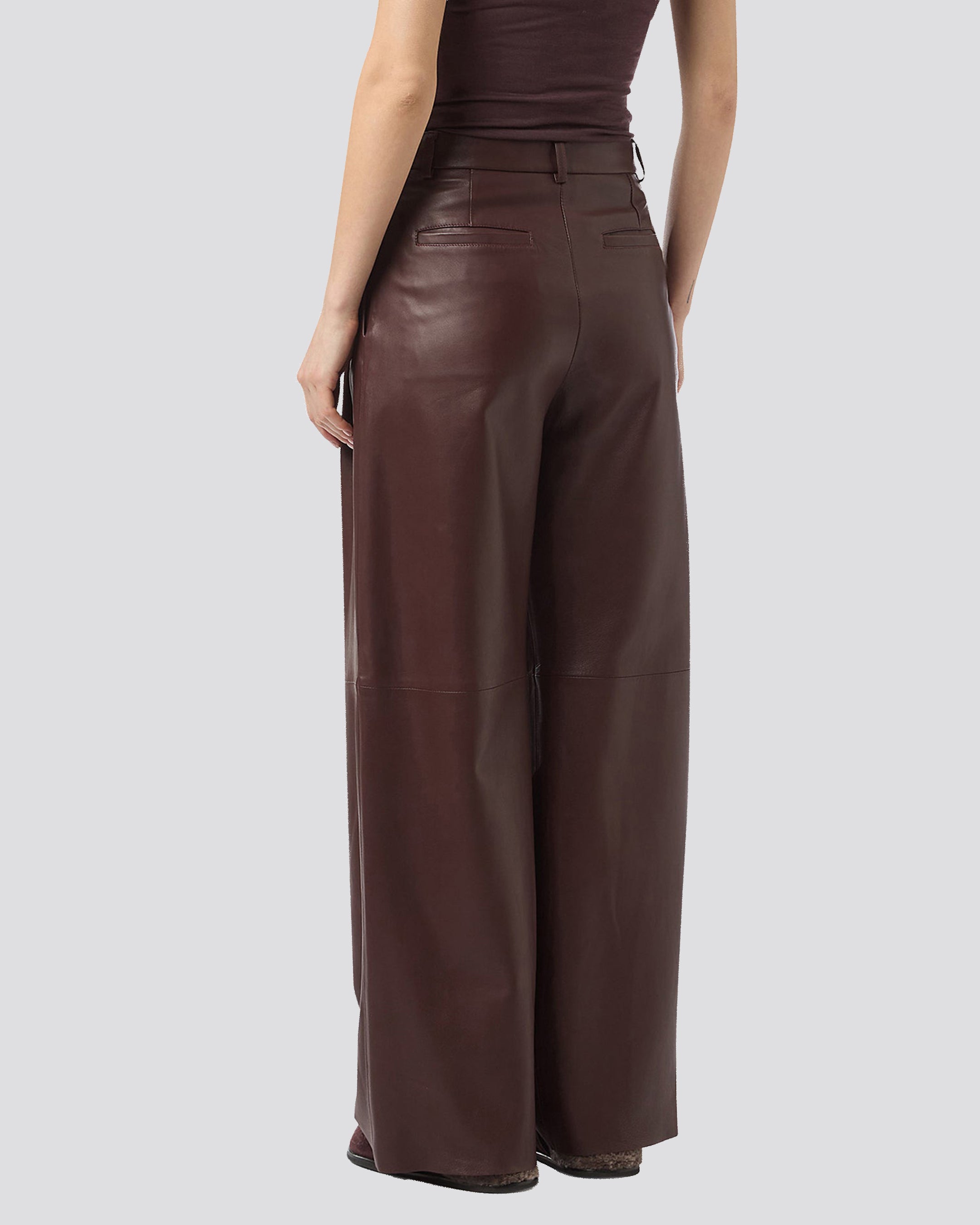 LEATHER TROUSERS WITH PENCES