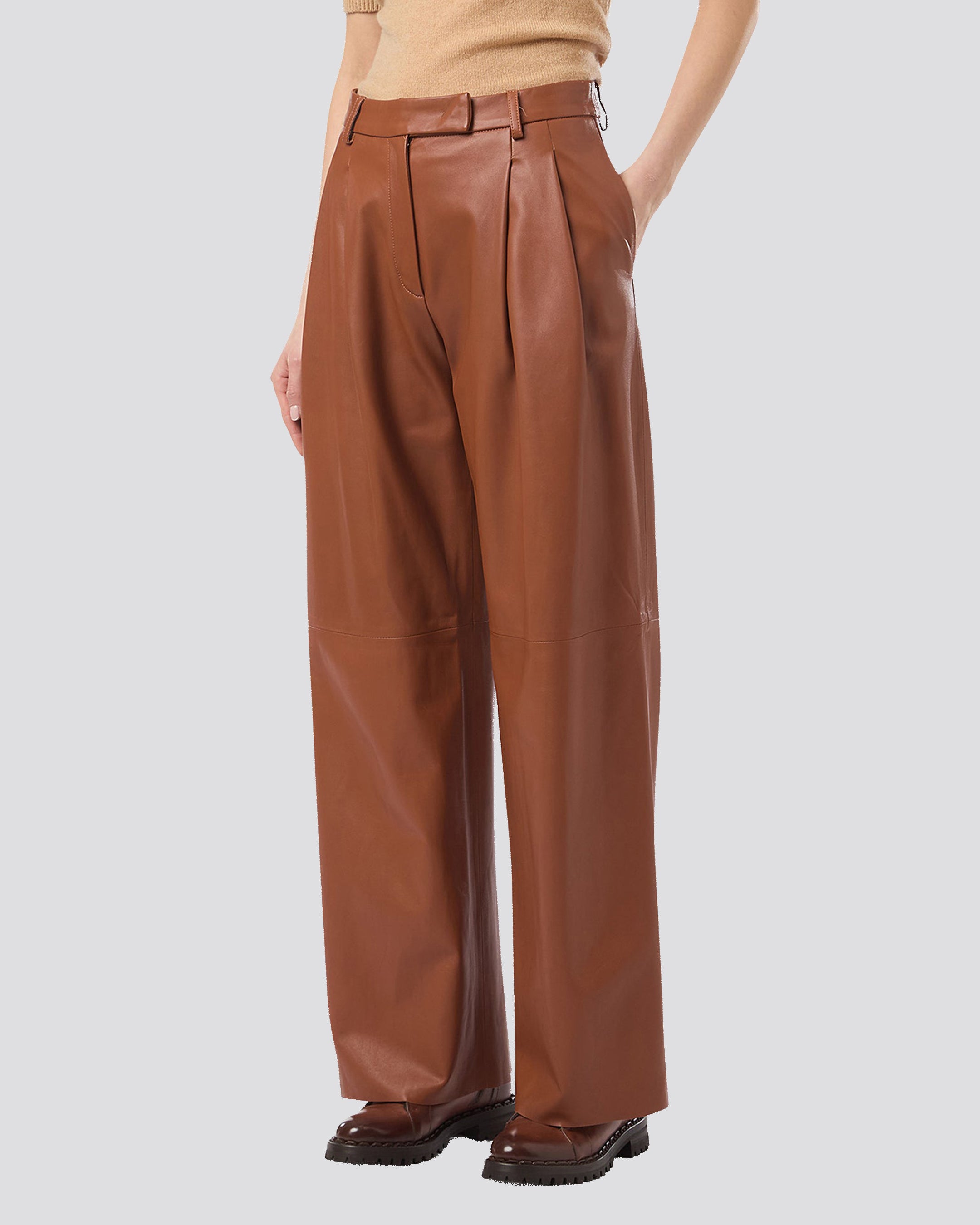 LEATHER TROUSERS WITH PENCES - 8