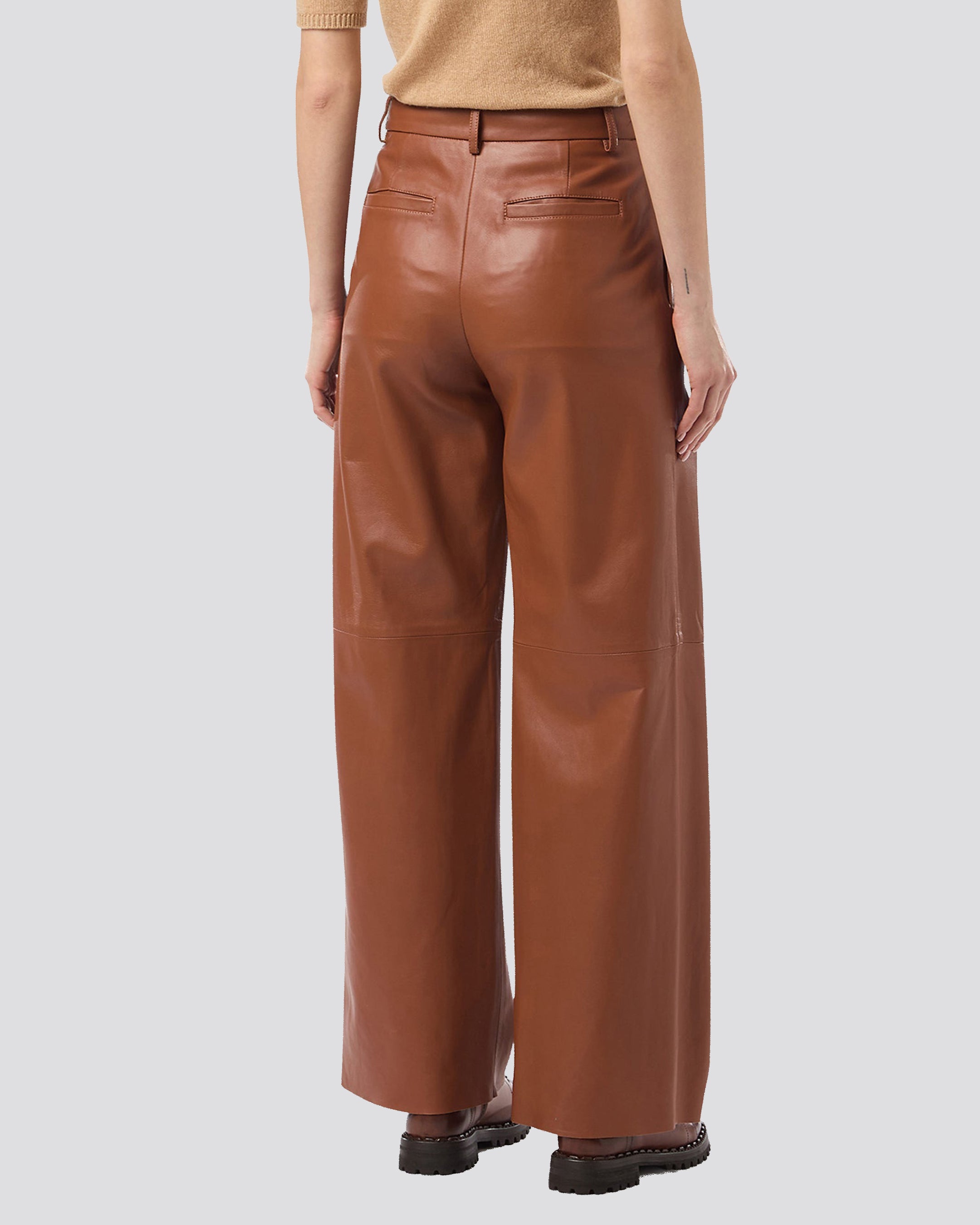 LEATHER TROUSERS WITH PENCES